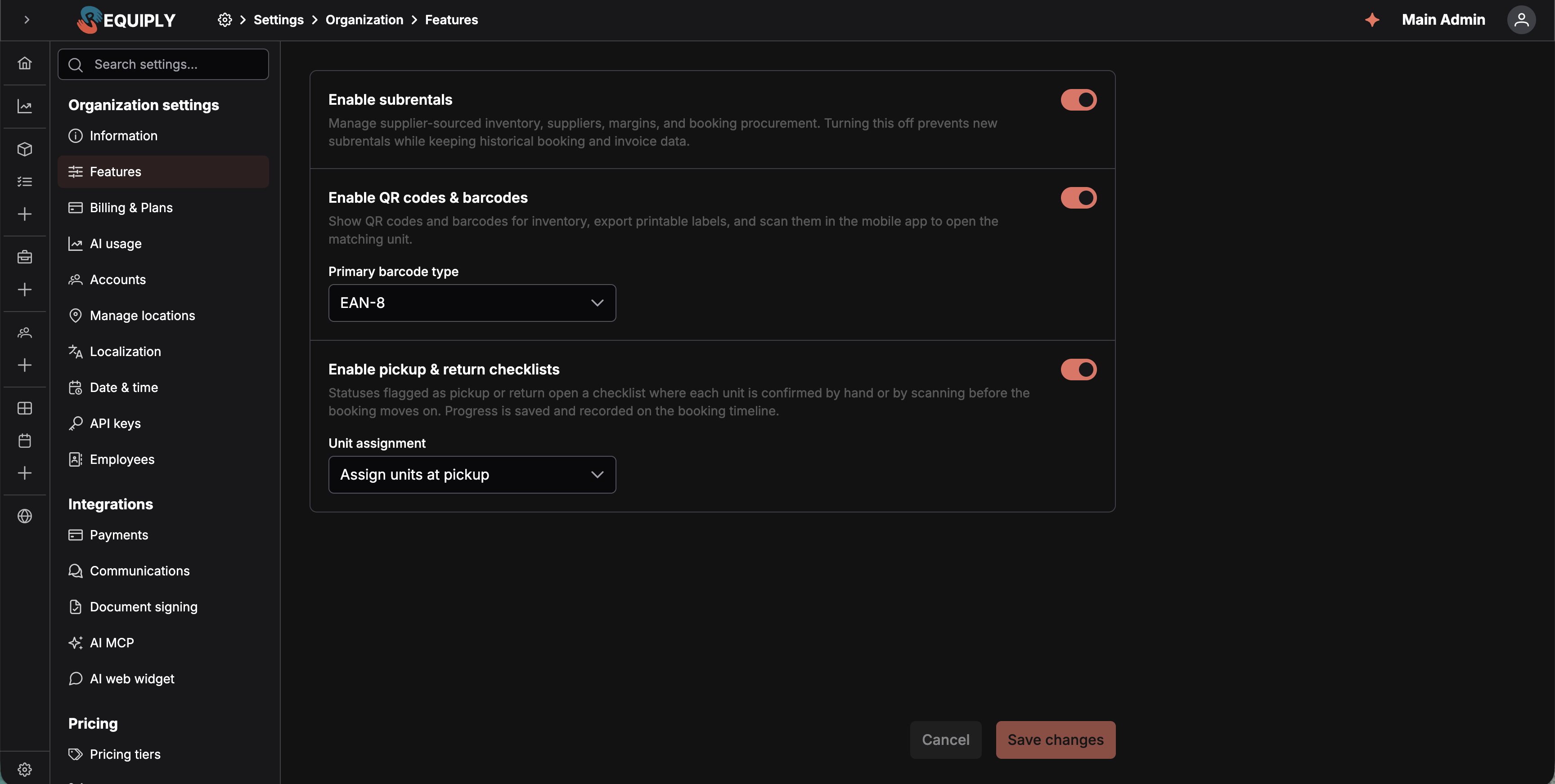 The Features page with three rows — Enable subrentals, Enable QR codes and barcodes, and Enable pickup and return checklists — each with a description and a toggle, all switched on; the barcode row carries a Primary barcode type dropdown set to EAN-8 and the checklist row a Unit assignment dropdown set to Assign units at pickup